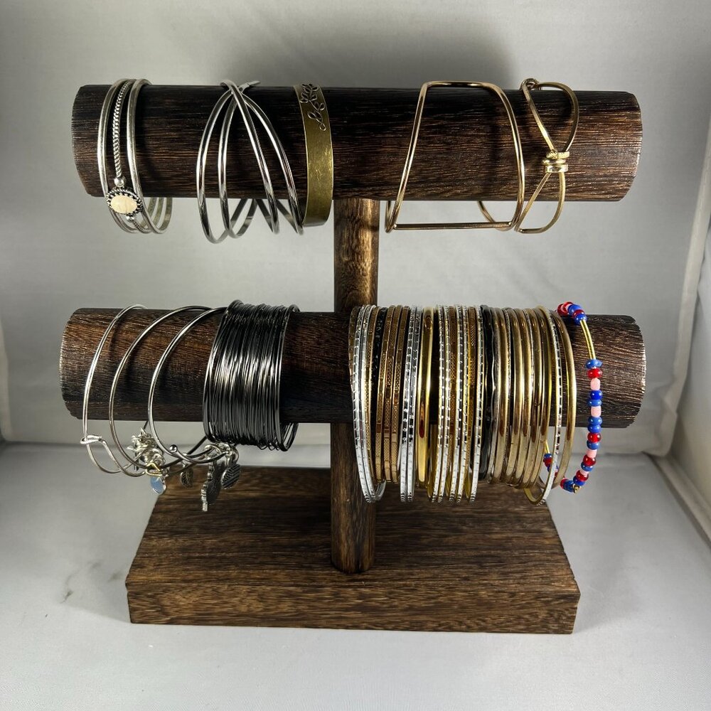Set Of Mixed Metal Bangles Bracelets With Charms & Beads On Wooden Display Stand